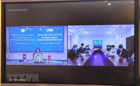 Hợp tác thông tin giữa TTXVN và Thông tấn xã Lào KPL