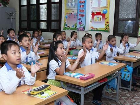 Học sinh lớp 1-6 ở Hà Nội trở lại trường
