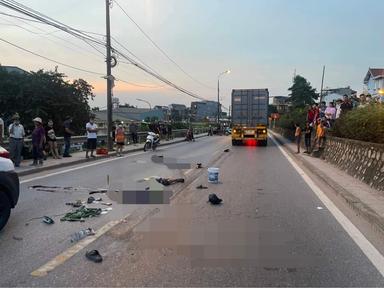 Va chạm với ô tô, 2 người đi xe máy bị xe container tông tử vong