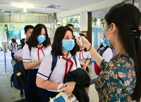 Khi có ca mắc COVID-19 trong trường học, cần làm gì?