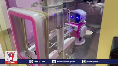 Robot phục vụ đồ ngọt tại Olympic Bắc Kinh