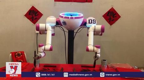 Độc đáo robot viết thư pháp
