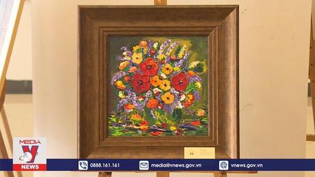 Triển lãm “Cọ non” kỷ niệm 77 năm thành lập TTXVN