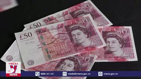 Anh tạm dừng tăng lãi suất