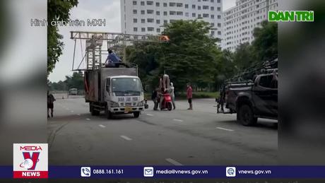 Công an đã làm việc vụ vừa chạy xe vừa làm xiếc chồng đầu