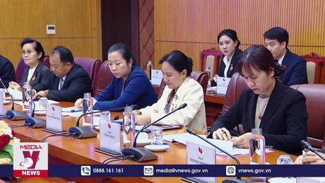 Việt Nam và Lào tăng cường trao đổi kinh nghiệm vận động quần chúng