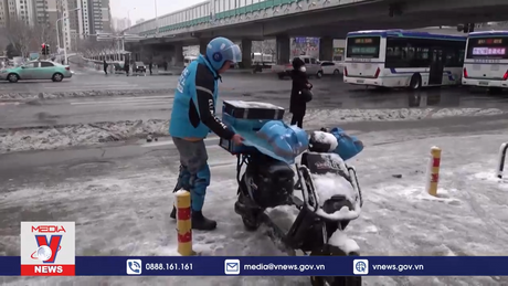Dịch vụ giao hàng ở Trung Quốc bận rộn mùa giá rét