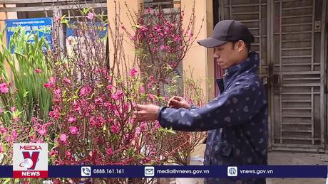 Thị trường cận Tết hàng hóa dồi dào sức mua giảm