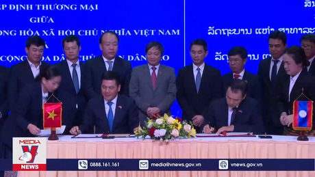 Việt Nam và Lào ký Hiệp định Thương mại mới