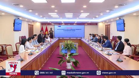 TTXVN chia sẻ kinh nghiệm với CLB nhà báo Campuchia