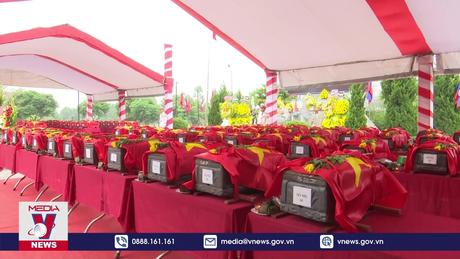 An táng 87 hài cốt liệt sĩ quân tình nguyện và chuyên gia Việt Nam hi sinh tại Lào