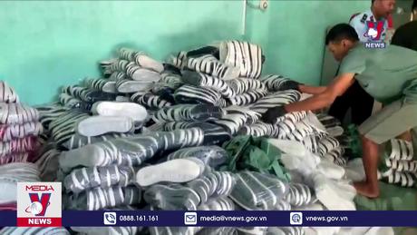 Triệt phá cơ sở làm giày giả thương hiệu lớn