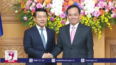 Phó Thủ tướng Trần Lưu Quang hội đàm với Phó Thủ tướng Lào