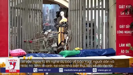 Biệt thự, chung cư ở Hà Nội đắp bao cát, dựng vách, dán kính chống gió bão