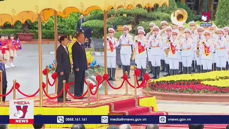 Lễ đón Tổng Bí thư, Chủ tịch nước Lào thăm cấp nhà nước tới Việt Nam