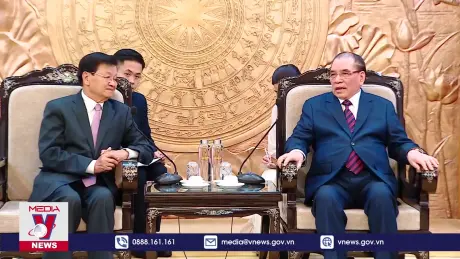 Tổng Bí thư, Chủ tịch nước Lào gặp nguyên Tổng Bí thư Nông Đức Mạnh