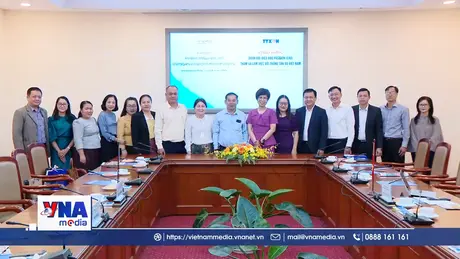 Thông tấn xã Việt Nam làm việc với Báo Pasaxon