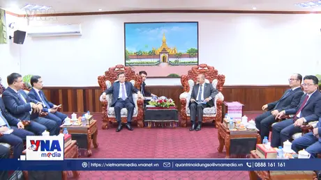 Việt Nam-Lào đẩy mạnh hợp tác về lý luận và chính trị